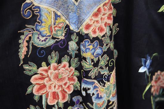 A Chinese black satin robe, 19th century, some wear